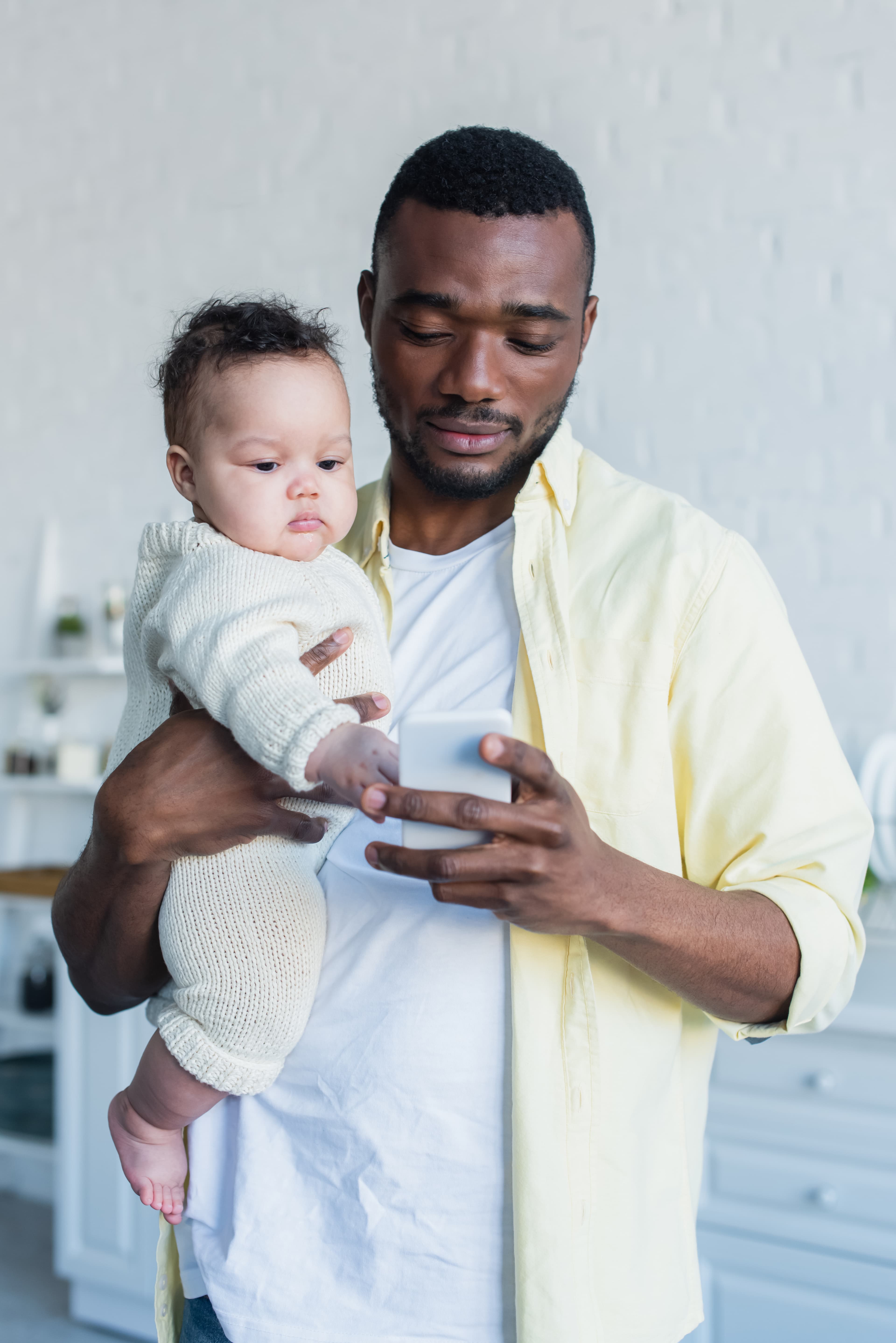 Father holding baby girl
